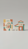 Artisan Architecture Set—packaging and completed build displayed together., Three-quarter angle tabletop shots that...