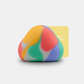 Mystery Blob limited-edition squishy toy, Default angle is a clean 3/4 view at desk height—product held gently by hands or...